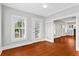 Living room features hardwood floors, bright light, and an open floor plan at 627 N Hyer Ave, Orlando, FL 32803