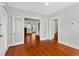 Living room features hardwood floors, bright light, and open floor plan at 627 N Hyer Ave, Orlando, FL 32803