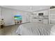 Studio living room with white cabinets and appliances at 627 N Hyer Ave, Orlando, FL 32803