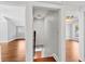Interior shot of the stairwell with adjacent rooms boasting new paint and flooring for modern appeal at 627 N Hyer Ave, Orlando, FL 32803