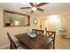 Inviting dining room with a large table, mirror, and stylish decor at 7119 Leighton Way, Orlando, FL 32822