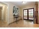 Hallway area with unique design and view to backyard at 7119 Leighton Way, Orlando, FL 32822