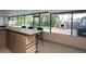 Enclosed patio features a tile counter bar with seating and view of the pool at 7119 Leighton Way, Orlando, FL 32822