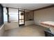 Enclosed patio featuring access to the outdoors and tile counter at 7119 Leighton Way, Orlando, FL 32822