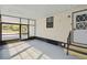 Enclosed patio with tile floors, stairs and an exit door at 721 Polo Park Blvd, Davenport, FL 33897