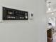 Retro wall panel with stereo, thermostat and pendant lights at 721 Polo Park Blvd, Davenport, FL 33897