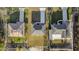 An aerial view of a home highlighting the roof, driveway, and backyard at 773 Marion Oaks Pass, Ocala, FL 34473