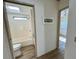 Bathroom and hallway area with wood flooring at 9000 Us Highway 192 # 835, Clermont, FL 34714