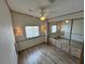 Bedroom featuring a ceiling fan, closet, and natural light at 9000 Us Highway 192 # 835, Clermont, FL 34714