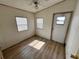 Bedroom with plank flooring, ceiling fan and natural light at 9000 Us Highway 192 # 835, Clermont, FL 34714