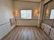 Spacious bedroom with built-in mirrored closet and laminate floors at 9000 Us Highway 192 # 835, Clermont, FL 34714