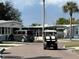 Picturesque community street scene with a golf cart at 9000 Us Highway 192 # 835, Clermont, FL 34714