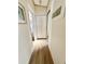 Hallway with wood plank flooring and adjacent rooms at 9000 Us Highway 192 # 835, Clermont, FL 34714