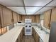 The well-maintained kitchen features ample counter space and modern appliances at 9000 Us Highway 192 # 835, Clermont, FL 34714