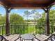 View from balcony of a lake and golf course at 9501 Tavistock Rd, Orlando, FL 32827