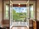View from balcony of a lake and golf course at 9501 Tavistock Rd, Orlando, FL 32827