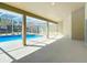 Spacious screened lanai featuring a covered area with plenty of room for outdoor enjoyment at 10012 Silver Bluff Dr, Leesburg, FL 34788