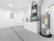 Well-equipped utility room with modern systems and ample space for storage at 10012 Silver Bluff Dr, Leesburg, FL 34788