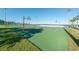 Outdoor basketball court with multiple hoops available in a golf community on a sunny day at 1024 Harbor Hill St, Winter Garden, FL 34787