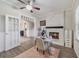 Office/flex space with a fireplace, wood floors, and an adjacent room through a cased opening at 1024 Harbor Hill St, Winter Garden, FL 34787