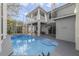 Screened-in pool and lanai area, with pool and covered seating area, attached to the house at 1024 Harbor Hill St, Winter Garden, FL 34787