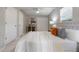 Comfortable bedroom featuring a plush bed with a tufted headboard and a ceiling fan at 103 Ford Ave, Altamonte Springs, FL 32701
