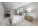 Bright bedroom with tile flooring, neutral walls, a ceiling fan, and stylish furnishings at 103 Ford Ave, Altamonte Springs, FL 32701