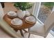 Cozy dining area with a round table set for four, perfect for intimate meals at 103 Ford Ave, Altamonte Springs, FL 32701
