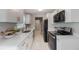 Updated kitchen with white countertops, modern appliances, and sleek cabinetry at 103 Ford Ave, Altamonte Springs, FL 32701