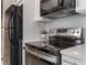 Modern kitchen with stainless steel appliances, sleek countertops, and a minimalist design at 103 Ford Ave, Altamonte Springs, FL 32701