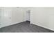 Bright bedroom with neutral walls, carpet, and a closet at 11157 Cyrilla Woods Dr, Orlando, FL 32832