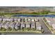 Aerial view of residential area near a pond at 12064 Encore At Ovation Way, Winter Garden, FL 34787