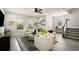 Bright living room with hardwood floors, stylish furniture, and plenty of natural light at 12064 Encore At Ovation Way, Winter Garden, FL 34787