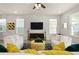 Comfortable living room with hardwood floors, modern decor, and plenty of seating at 12064 Encore At Ovation Way, Winter Garden, FL 34787