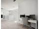 Bright loft area with a modern desk and dual computer setup at 12064 Encore At Ovation Way, Winter Garden, FL 34787