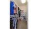 Walk-in closet offering ample shelving and hanging storage solutions for organized living at 15672 Shorebird Ln, Winter Garden, FL 34787