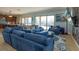 Bright and airy living room with sliding glass doors that open to the patio and pool at 15672 Shorebird Ln, Winter Garden, FL 34787