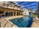 Beautifully screened-in pool with a patio, perfect for entertaining and relaxation at 15672 Shorebird Ln, Winter Garden, FL 34787