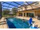 A stunning private pool and patio area perfect for relaxing and entertaining at 15672 Shorebird Ln, Winter Garden, FL 34787