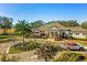 Exterior shot of community center with attractive landscaping and easy access parking at 1598 Barberry Dr, Kissimmee, FL 34744