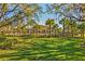 Exterior view of the community center, pool area and lawn at 1598 Barberry Dr, Kissimmee, FL 34744