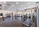 Bright fitness center with ceiling fans and an array of modern equipment at 1598 Barberry Dr, Kissimmee, FL 34744