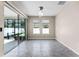Bright living room with sliding glass doors to outdoor patio at 1598 Barberry Dr, Kissimmee, FL 34744