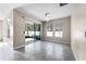 Bright living room with sliding glass doors to outdoor patio at 1598 Barberry Dr, Kissimmee, FL 34744