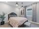 Comfortable bedroom with stylish furniture, soft lighting, and modern decor at 1763 Standing Rock Cir, Oakland, FL 34787