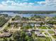 Picturesque neighborhood with mature trees, situated near a beautiful, expansive lake at 2031 Roseway Ave, Deltona, FL 32738