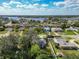 Scenic community view near a waterfront, featuring lush greenery and well-maintained homes at 2031 Roseway Ave, Deltona, FL 32738