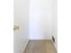 Hallway with tile flooring and white walls, providing a simple and functional space at 2031 Roseway Ave, Deltona, FL 32738