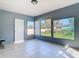 Inviting sunroom with many windows providing a beautiful outdoor view at 2031 Roseway Ave, Deltona, FL 32738
