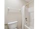 Bathroom featuring a shower/tub combo and a white shower curtain at 2136 Shadow Creek Dr, Kissimmee, FL 34746